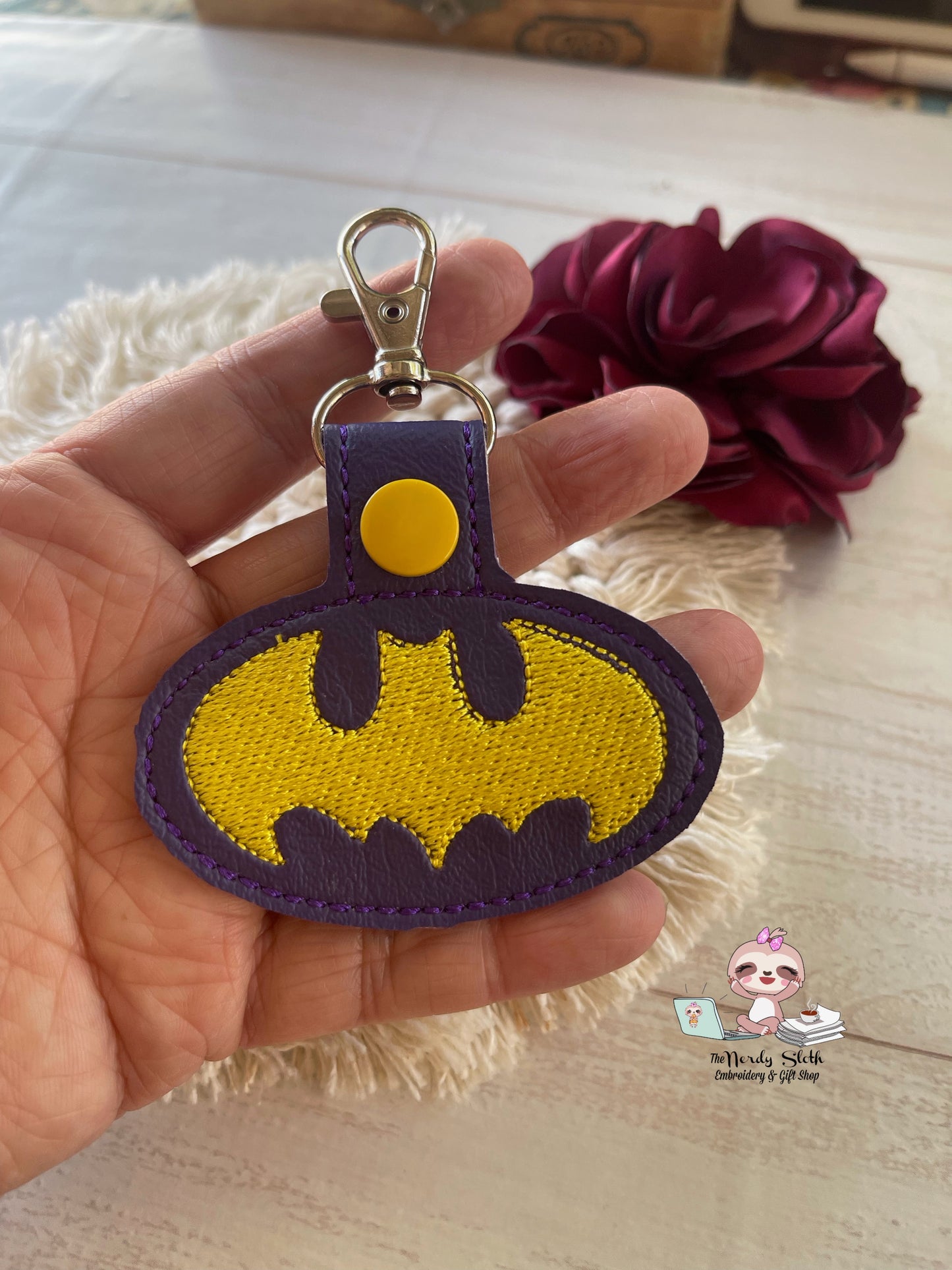 Bat Symbol Yellow/Purple Keychain