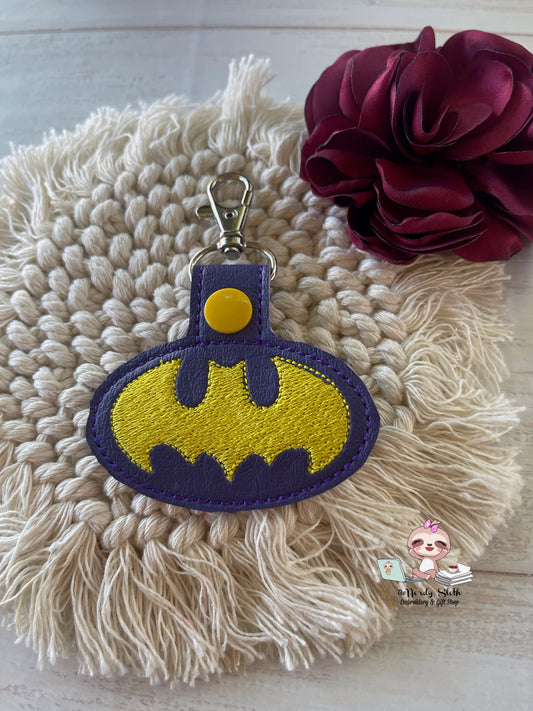 Bat Symbol Yellow/Purple Keychain